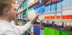 textbooks on the library shelves